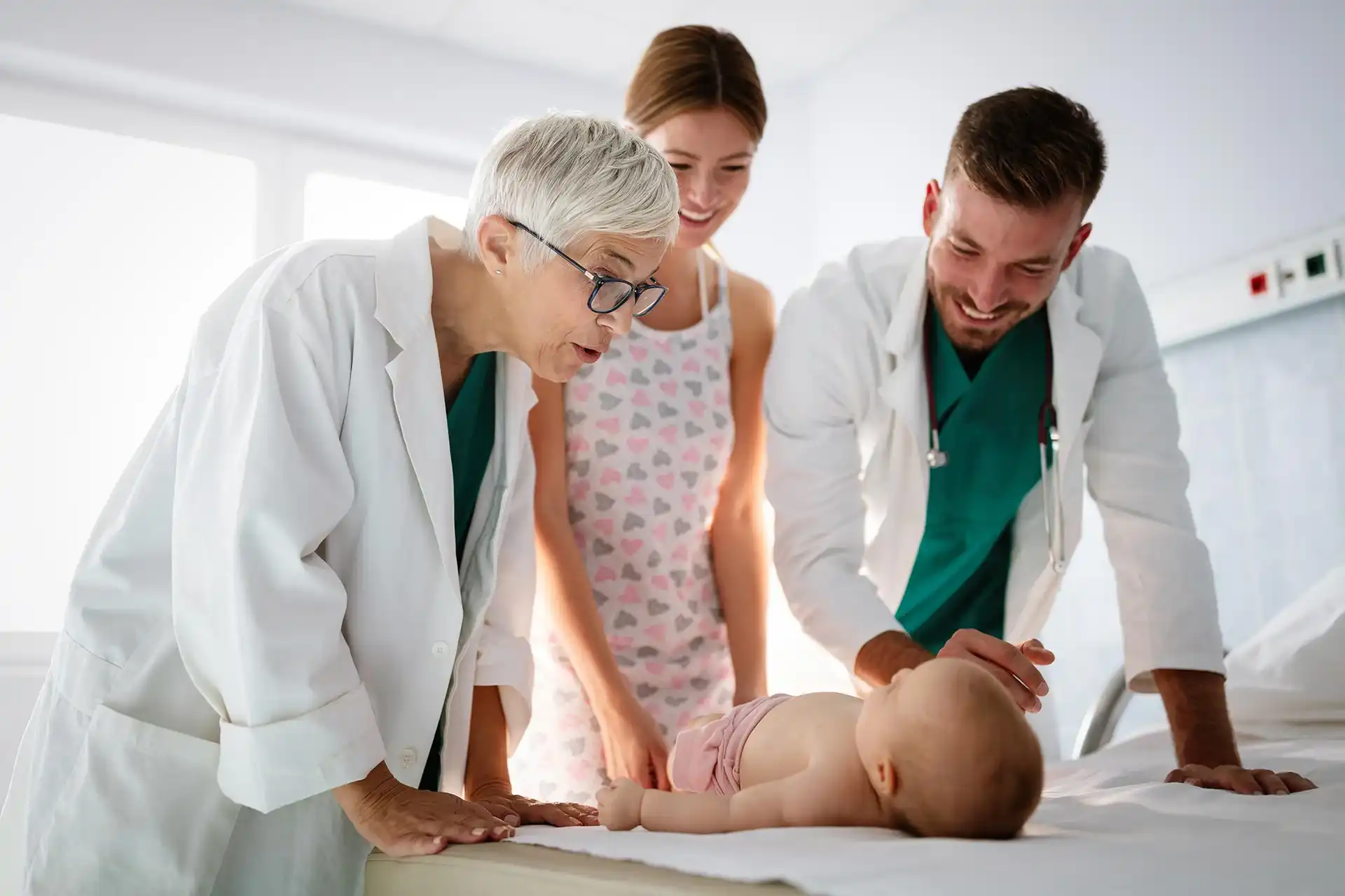 Mother and baby during a routine wellness checkup at Amen Family Medicine in Livonia
