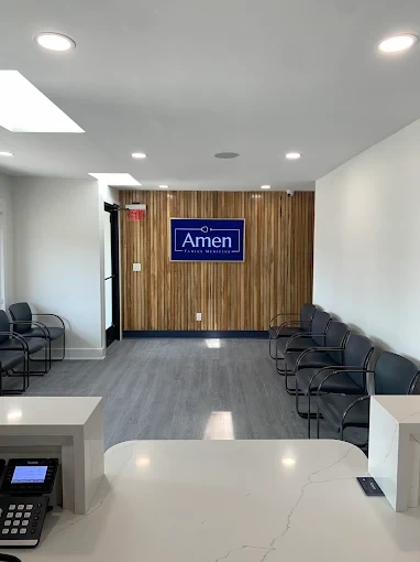 Modern patient waiting room and reception area at Amen Family Medicine in Livonia.